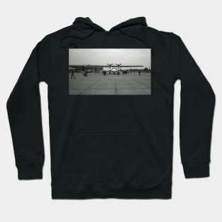 Man walking across consolidated PBY-5A Catalina Hoodie